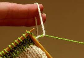 Join yarn in knitting at beginning of row